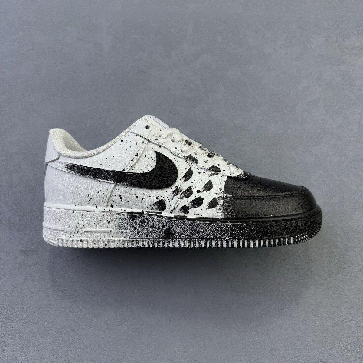 Custom Air Force 1 sneakers in black and white, handmade