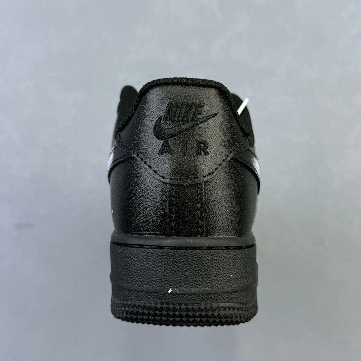 Custom Air Force 1 sneakers in black and white, handmade