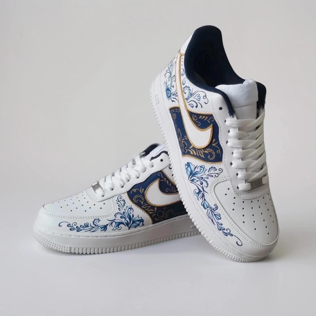 Custom-made white Gzhel- style sneakers, hand-painted with blue floral filigree and gold, a one-of-a-kind gift for AF1 sneakers