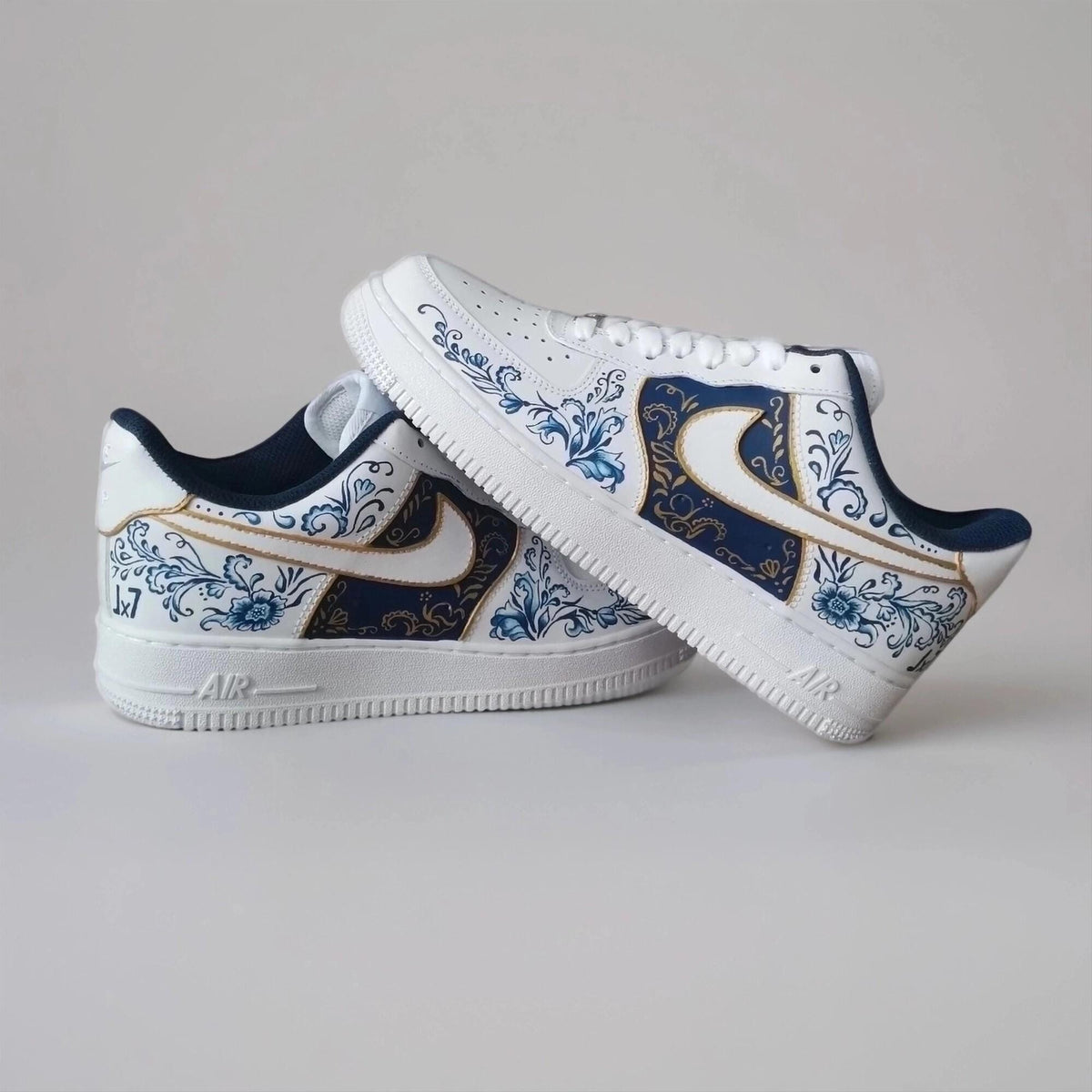 Custom-made white Gzhel- style sneakers, hand-painted with blue floral filigree and gold, a one-of-a-kind gift for AF1 sneakers